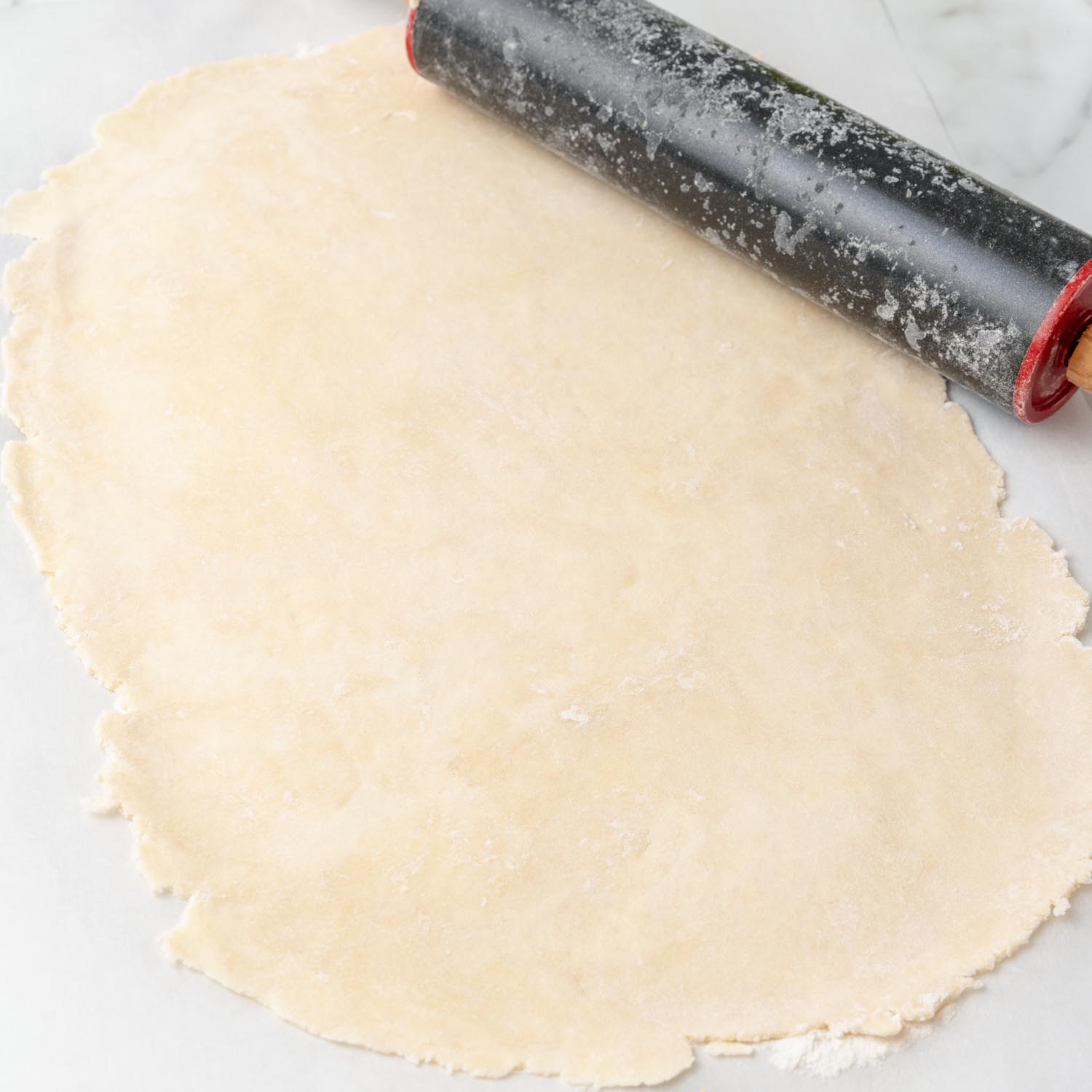 pie crust rolled out into a large rectangle for apple slab pie