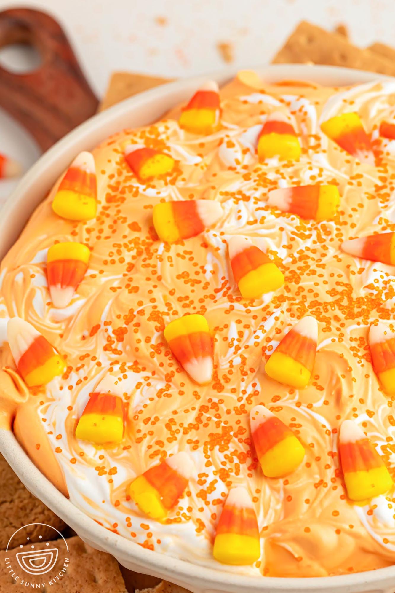 Close up shot of candy corn dip in a bowl