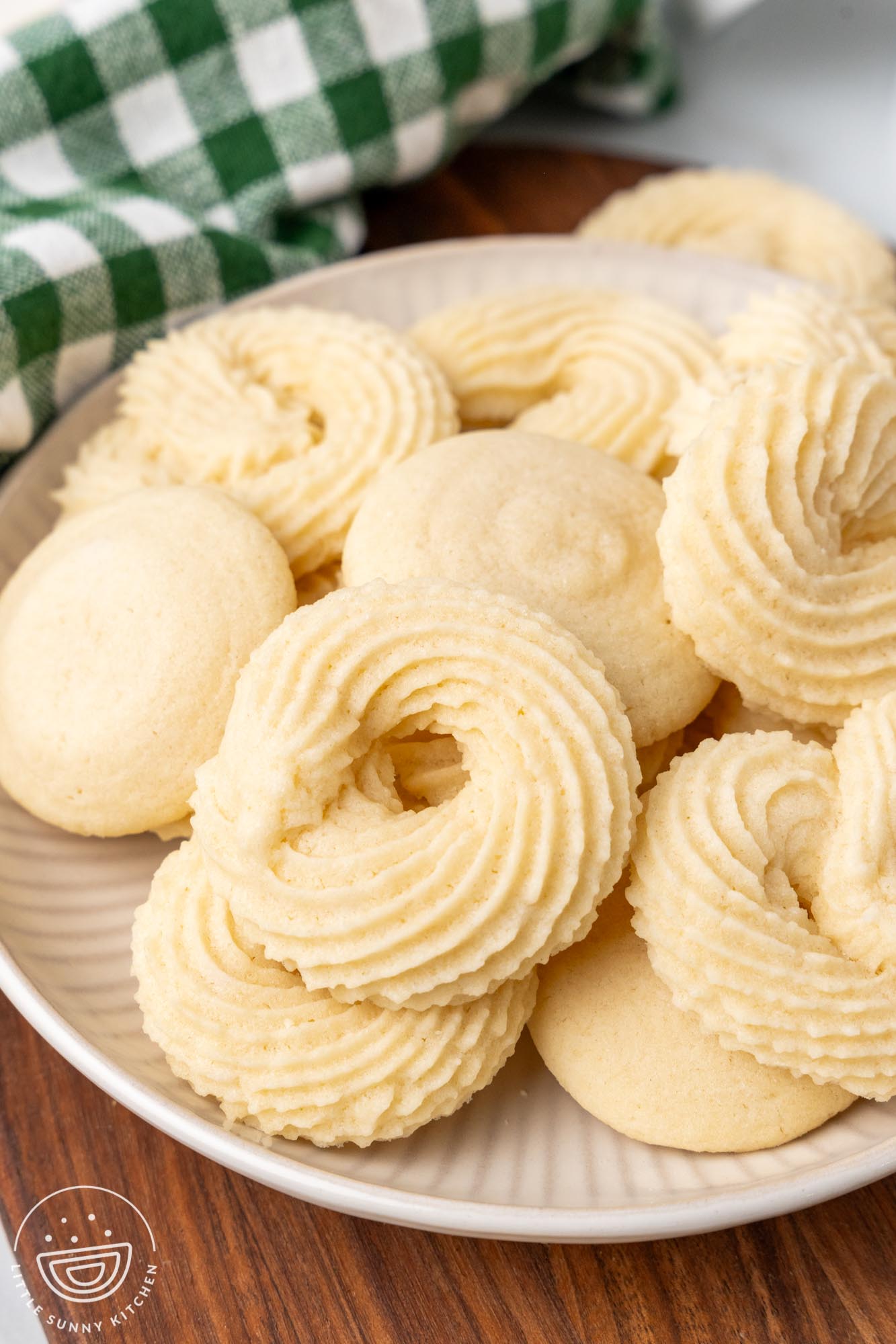 a platter of round, fluted danish butter cookies.