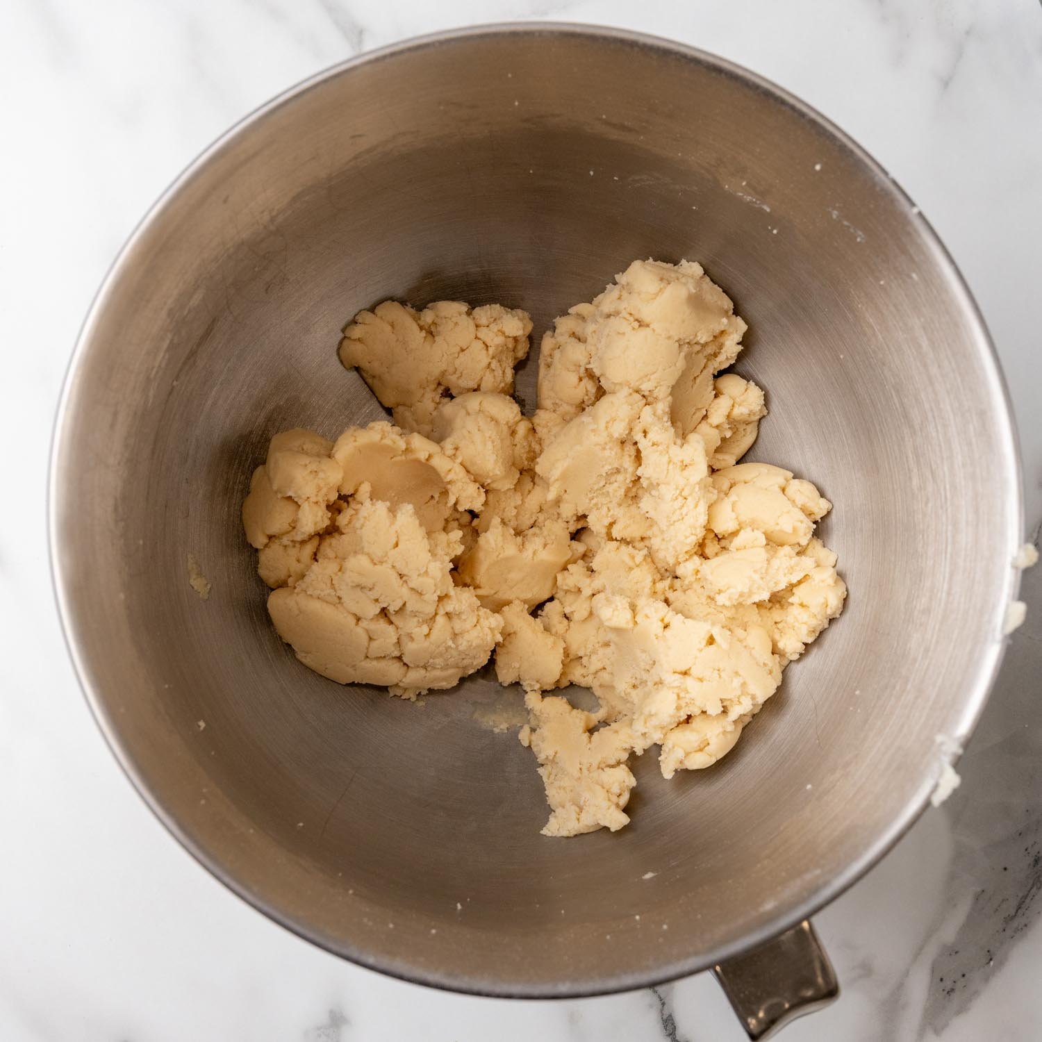 danish butter cookie dough in a metal mixing bowl.