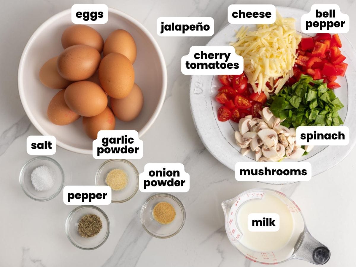 Ingredients for making egg muffins with cheese and vegetables.