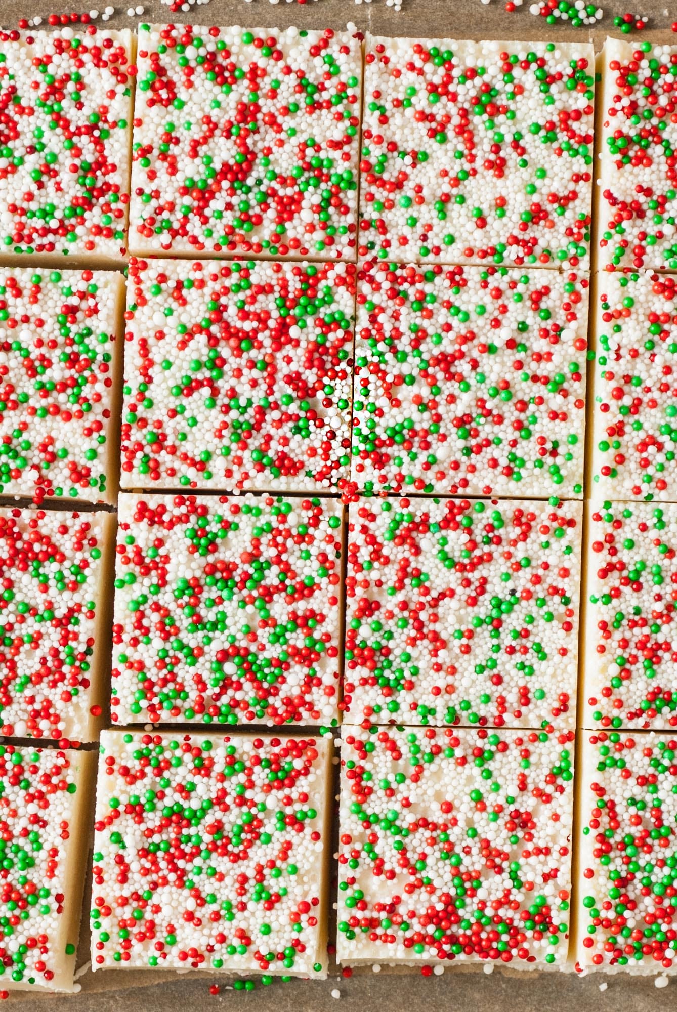 a tray of christmas cookie fudge, cut into squares.