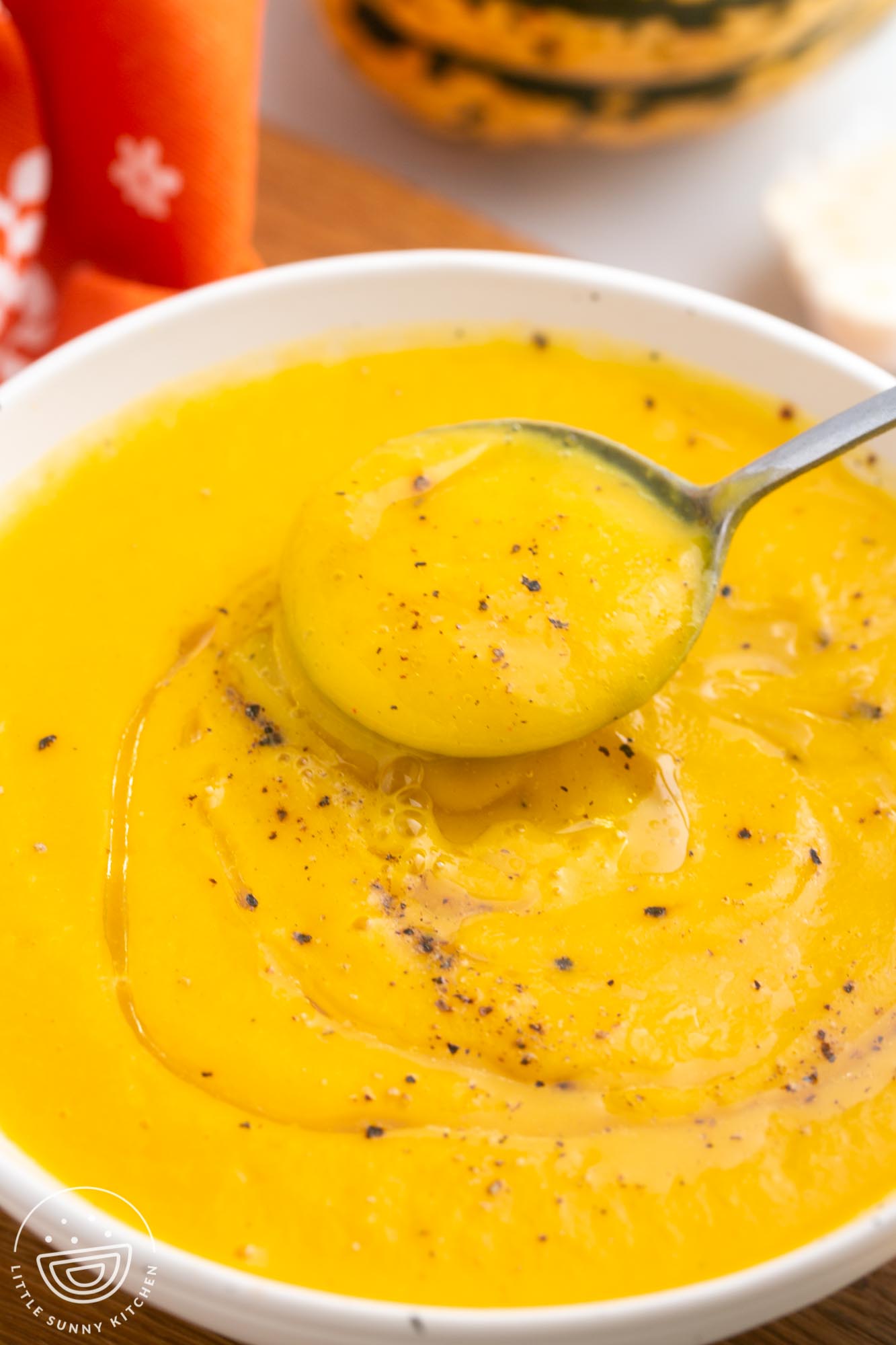 closeup of thick and creamy acorn squash soup.