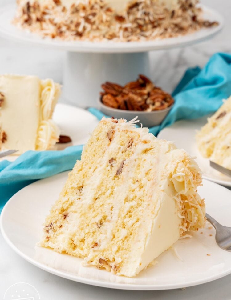 a slice of Italian Cream cake on a plate.