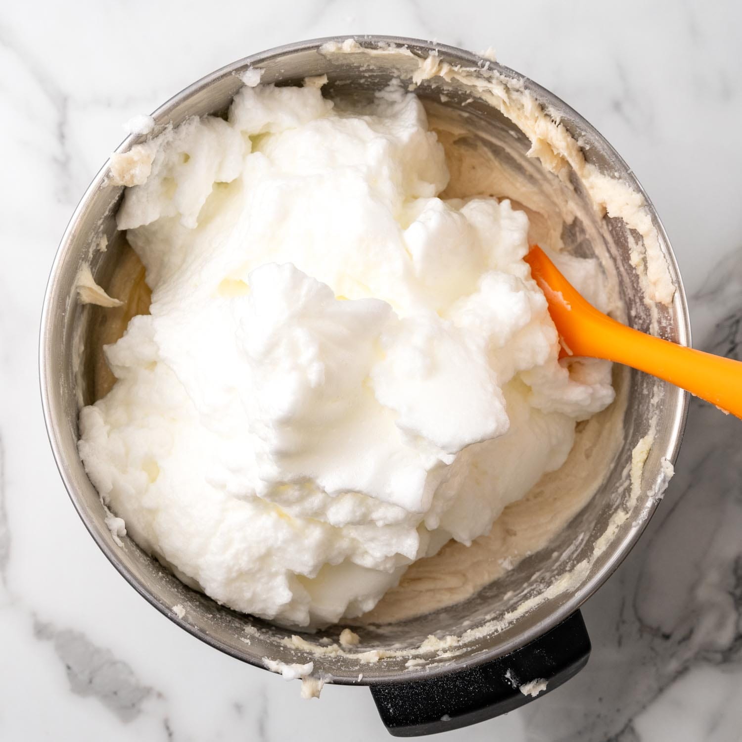 whipped egg whites folded in to lane cake batter.