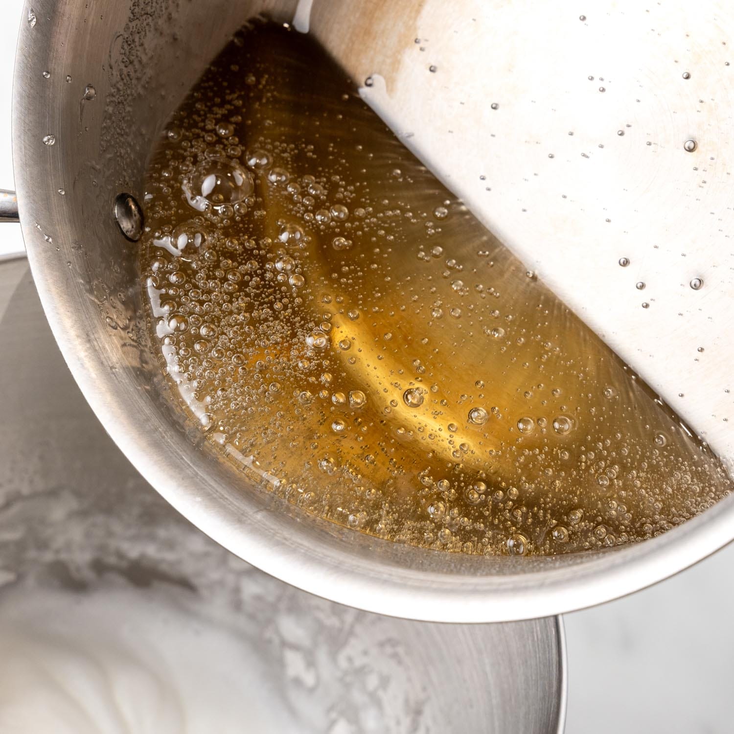 boiled sugar mixture added to whipped egg whites to make 7 minute frosting.