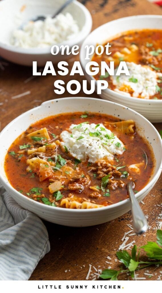 a white ceramic bowl of lasagna soup garnished with cheese and basil. Text overlay says "one pot lasagna soup"