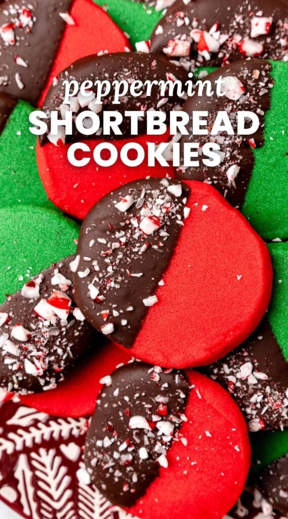 red and green shortbread cookies dipped into chocolate and topped with crushed peppermints. Text overlay says "peppermint shortbread cookies"