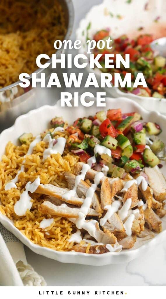 bowls of shawarma rice with chicken and cucumber salad, drizzled with yogurt sauce.