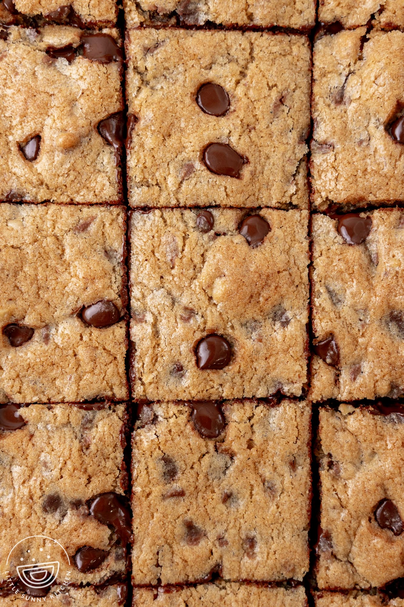 closeup view of toll house cookie bars cut into squares.