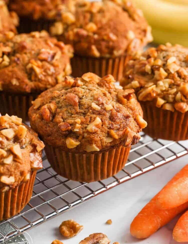 carrot banana muffins cooling on a wire rack.