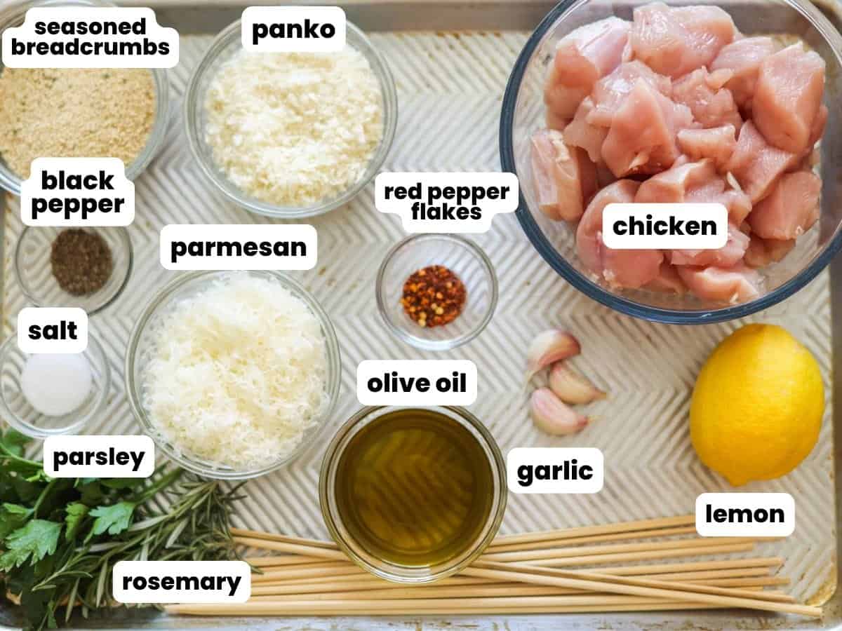 Ingredients for chicken spiedini, including breadcrumbs, parmesan, and lemon.