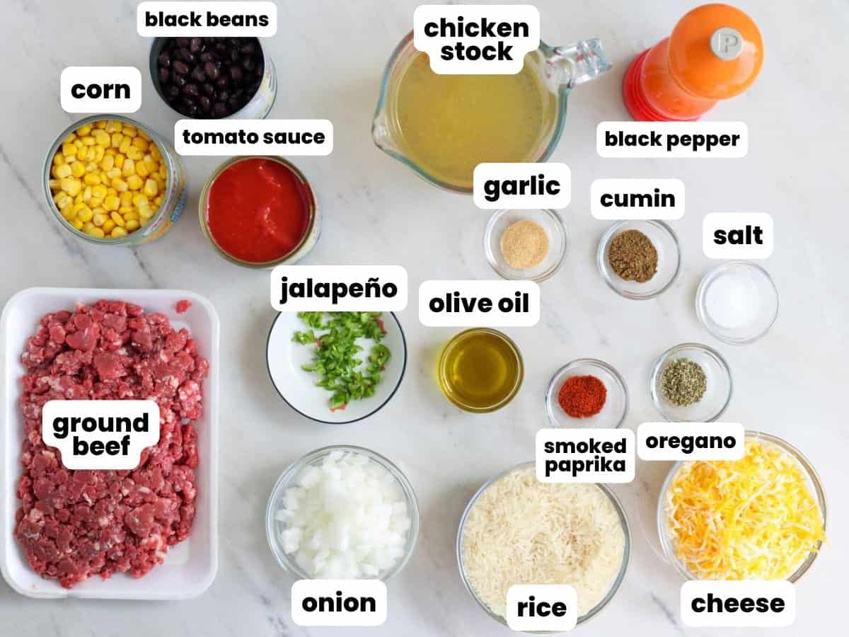 The ingredients needed to make one pan mexican beef and rice skillet with corn and black beans.