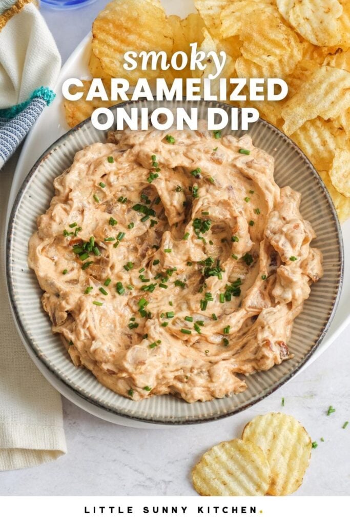 a ceramic bowl of creamy dip with potato chips on the side. Text overlay says "smoky caramelized onion dip"