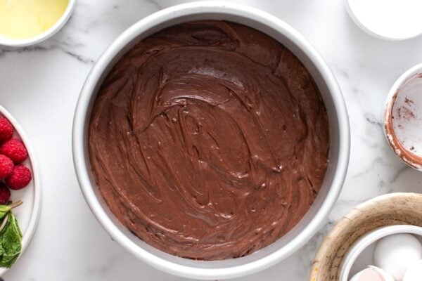batter for flourless chocolate cake in a round cake pan.