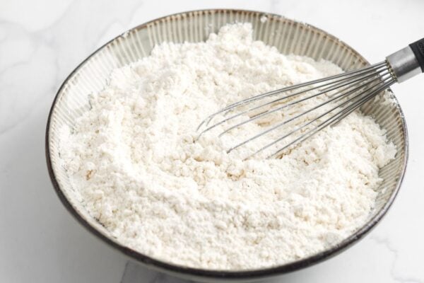 flour, baking powder, and salt whisked together in a bowl.