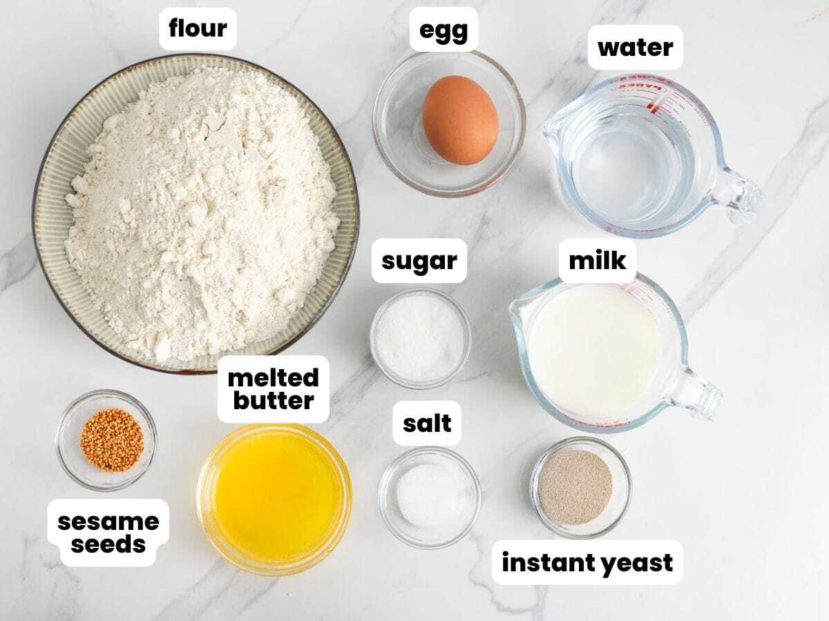 hamburger buns ingredients, including flour, butter, sugar, sesame seeds. 