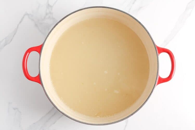 chicken stock in a round dutch oven.