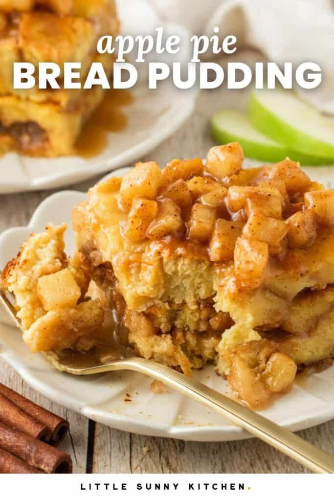 a piece of bread pudding with apples on a white dessert plate. Text overlay says "apple pie bread pudding"