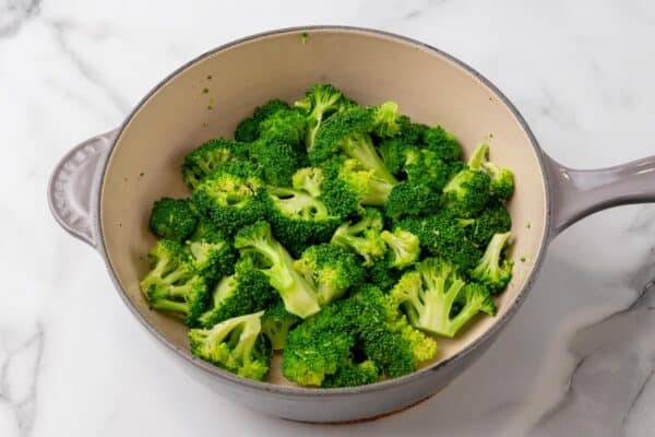 broccoli florets in a small saucepan.