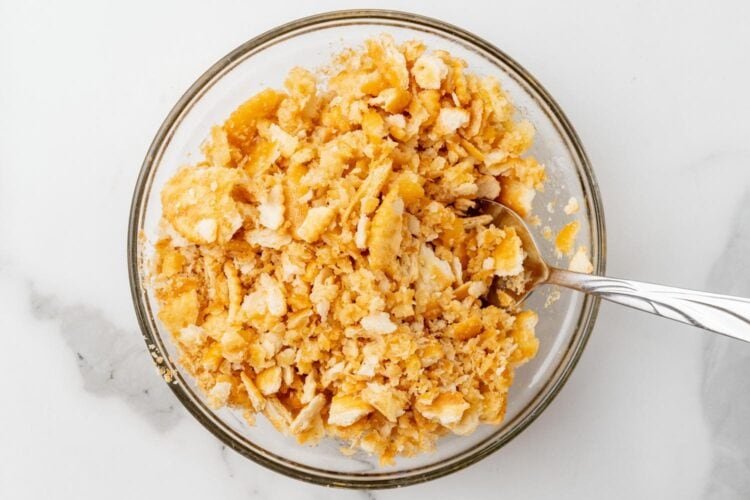 crushed ritz crackers in a small glass bowl.