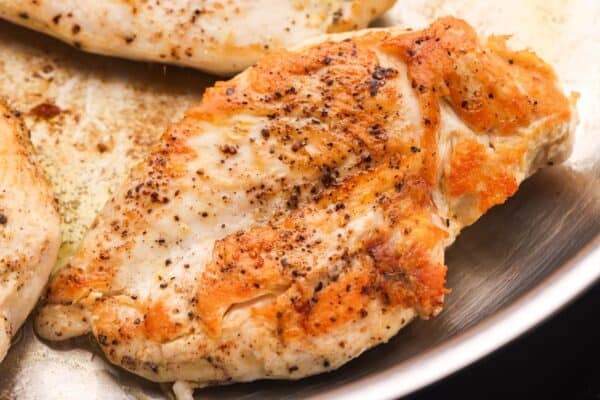 pan seared chicken breast cutlets, closeup.