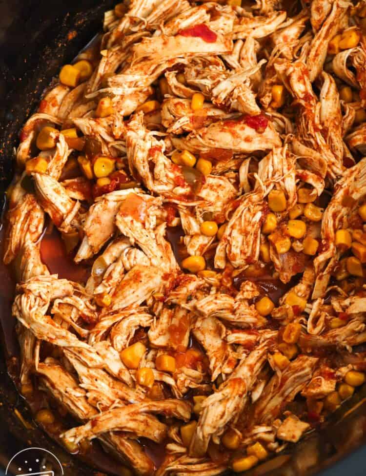 shredded crockpot salsa chicken with corn kernels