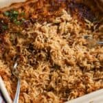a square baking dish of rice baked with a stick of butter and broth.