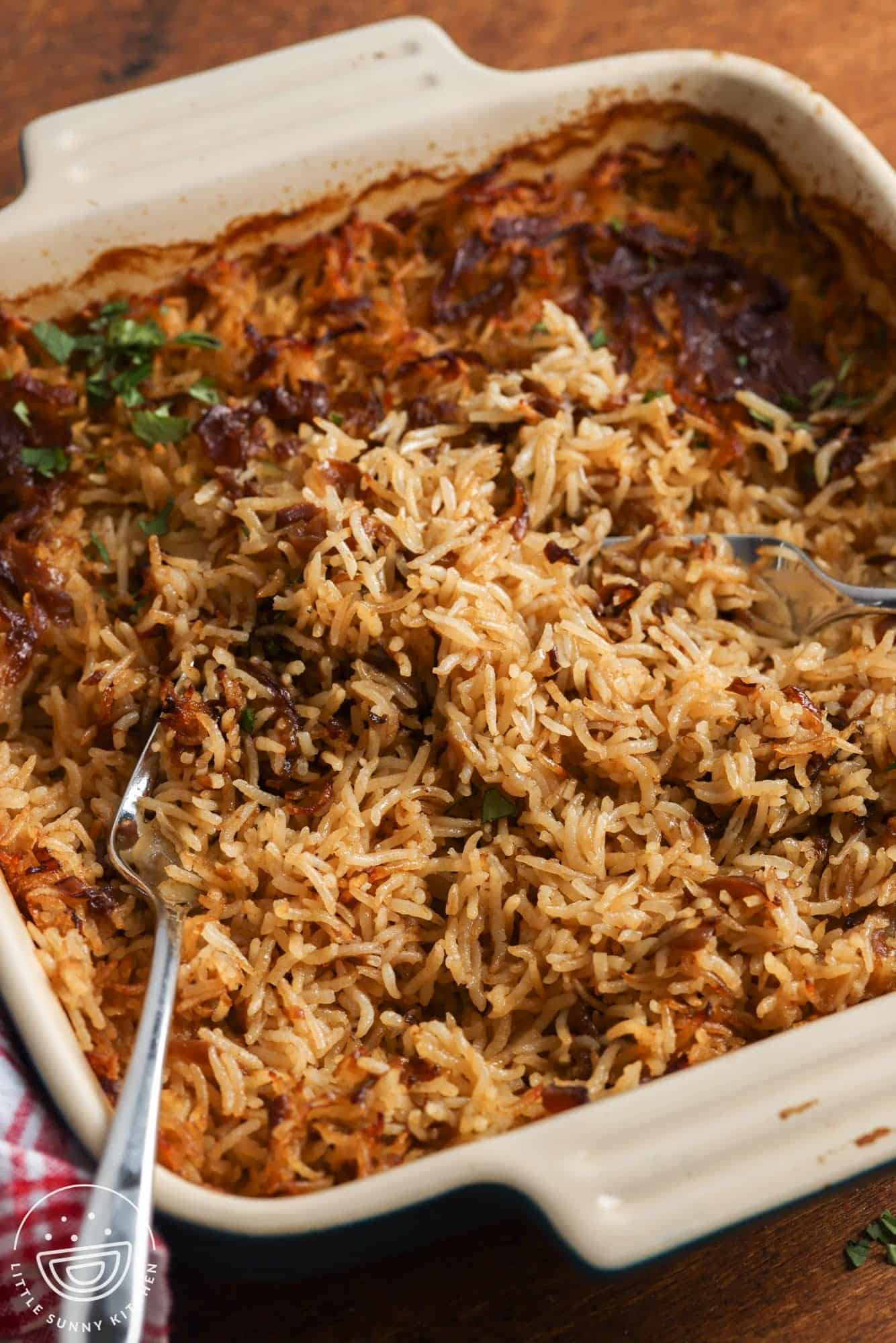 a square baking dish of rice baked with a stick of butter and broth.
