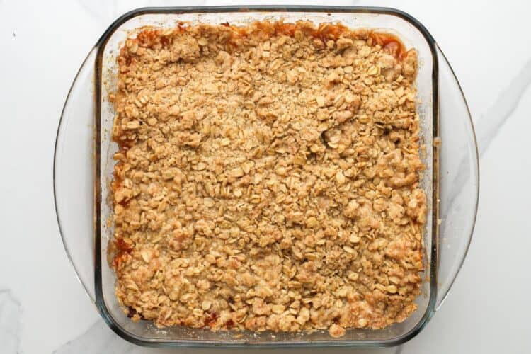 baked apple crisp with browned oat topping.