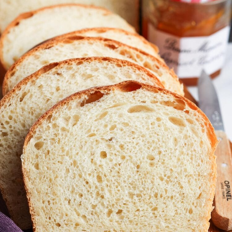 Soft slice of sandwich bread, with more slices in the background