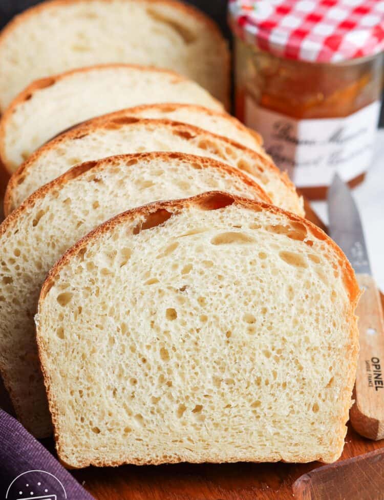 Soft slice of sandwich bread, with more slices in the background