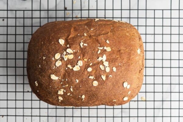 Load of brown bread on a wire rack