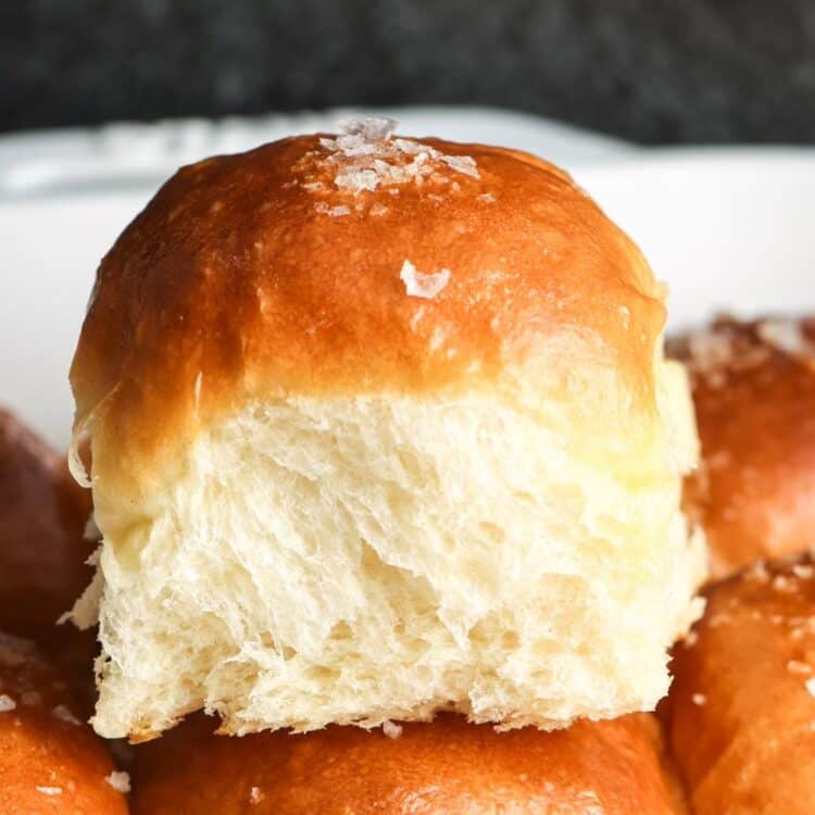 Close up shot of a soft dinner rolls showing its texture