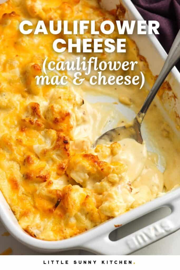 Creamy, cheesy cauliflower baked in a pan. The text overlay says "Cauliflower cheese (cauliflower mac and cheese)"