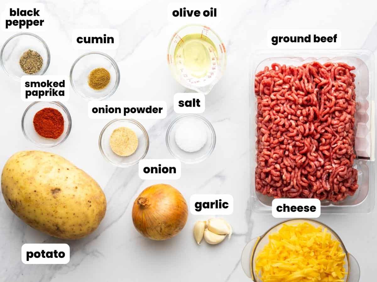 Ground beef, potatoes, and cheese, along with seasonings to make a one skillet ground beef dinner. 
