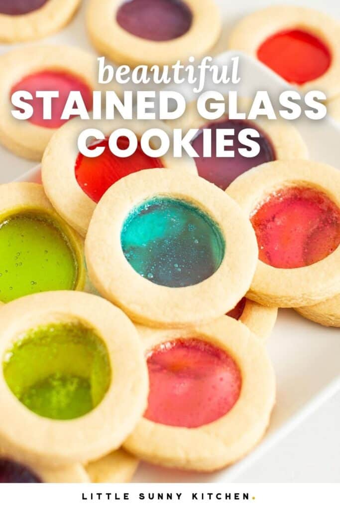 Round sugar cookies with colorful sugar windows. Text overlay says "beautiful stained glass cookies"