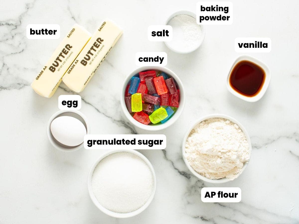 Ingredients for making stained glass cookies with jolly rancher candies.