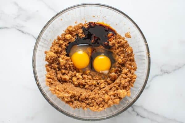 butter and brown sugar mixed, then eggs and molasses added to the bowl.