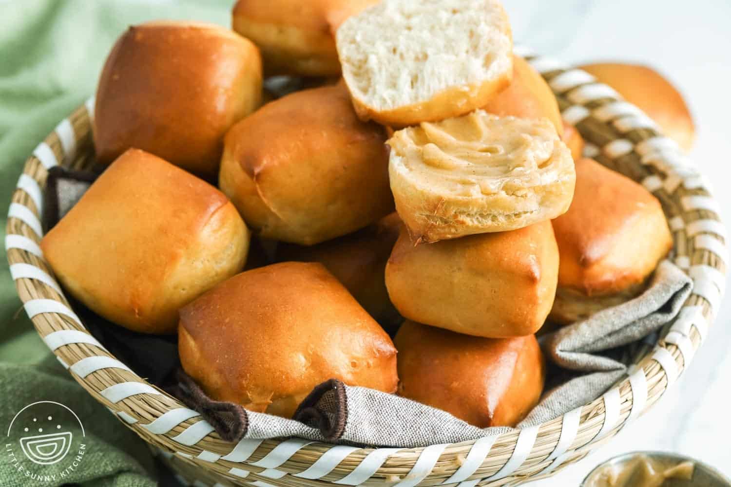 Horizontal image of texas roadhouse dinner rolls in a bread basket