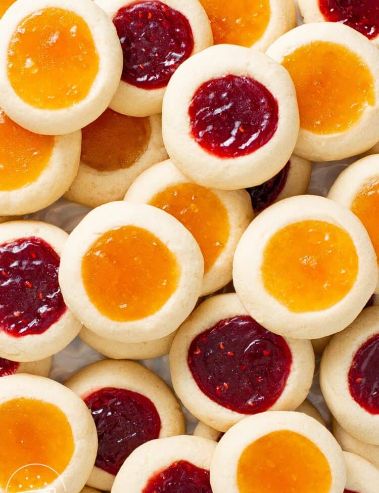 two layers of mixed raspberry and apricot jam thumbprints.