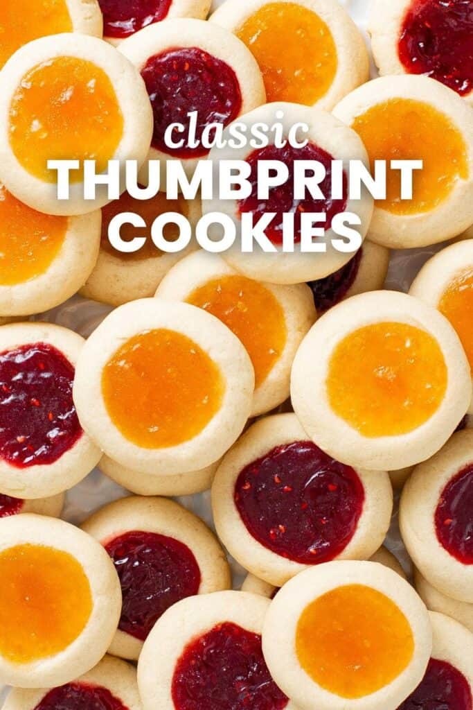 Apricot and raspberry thumbprints, in two layers. Text overlay says "classic thumbprint cookies"