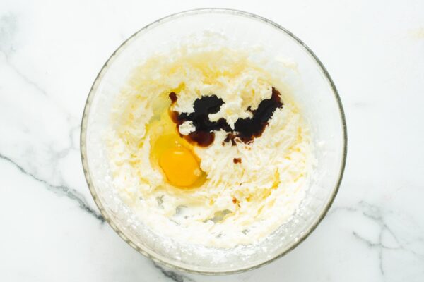 egg and vanilla added to fluffy, creamed butter and sugar.