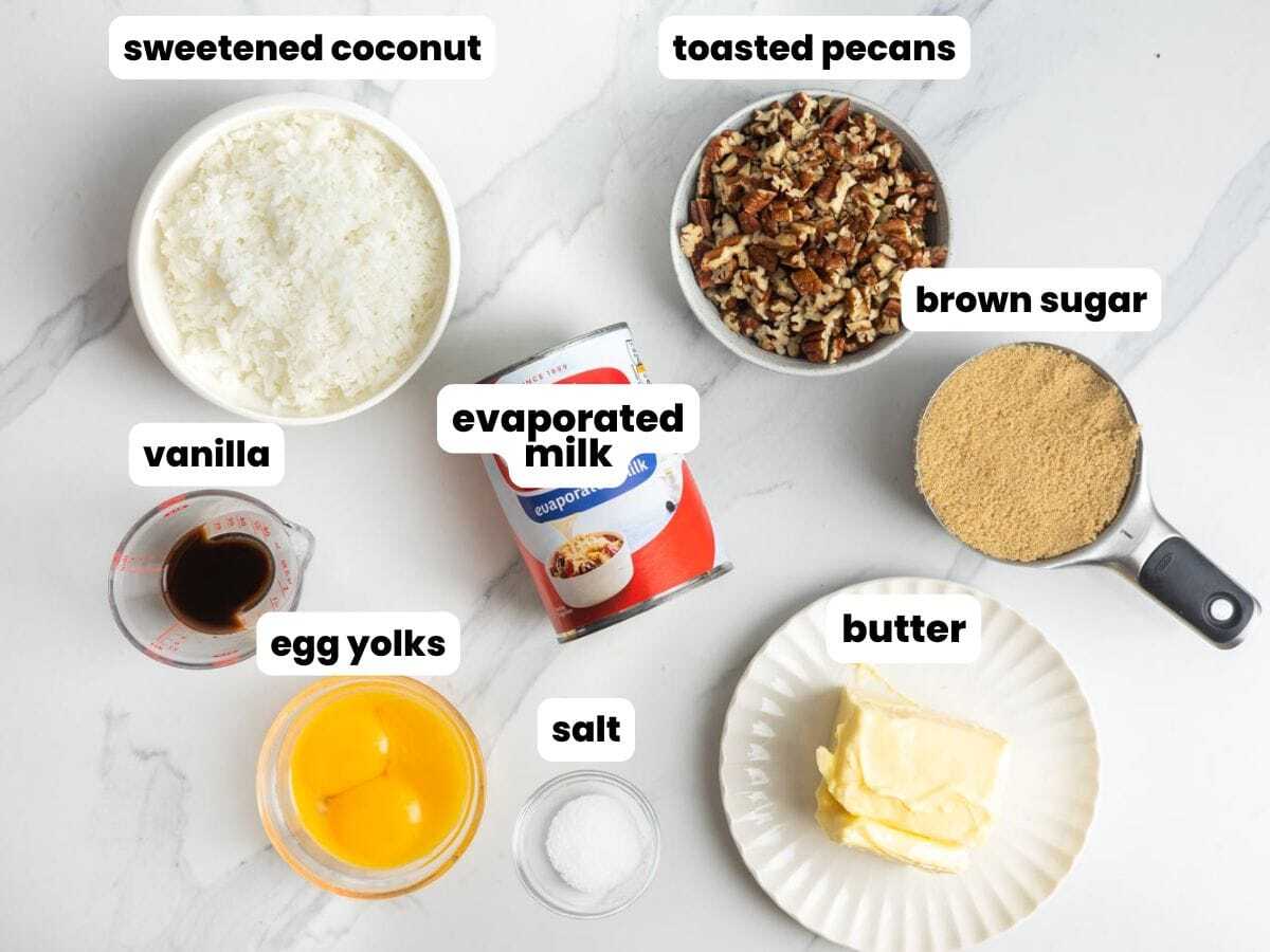 Ingredients for german chocolate cake filling with coconut and pecans.