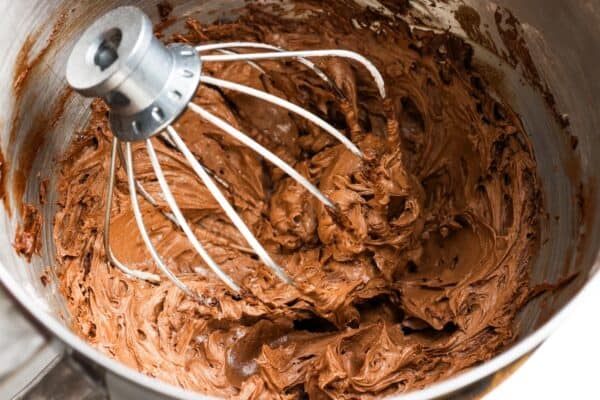 chocolate buttercream in the bowl of a stand mixer.
