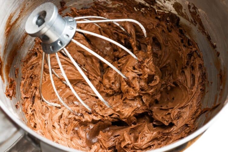chocolate buttercream in the bowl of a stand mixer.