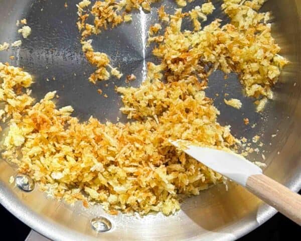 Toasting breadcrumbs in a pan
