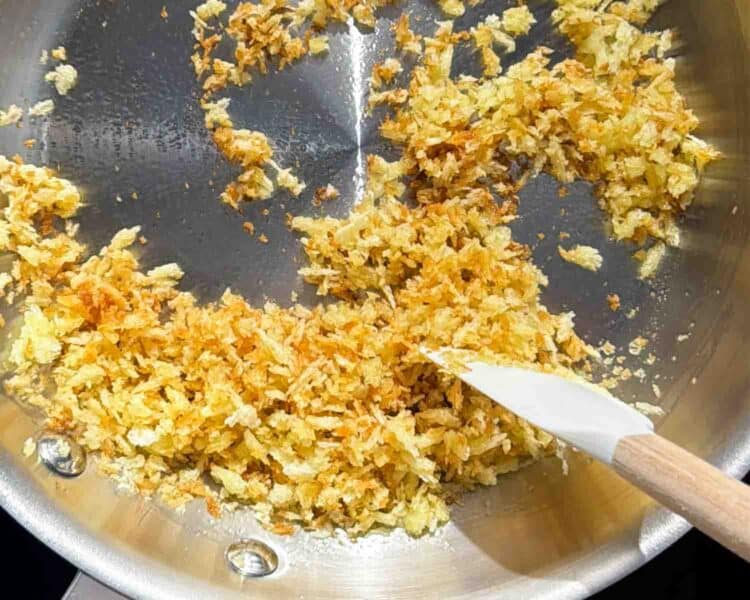 Toasting breadcrumbs in a pan