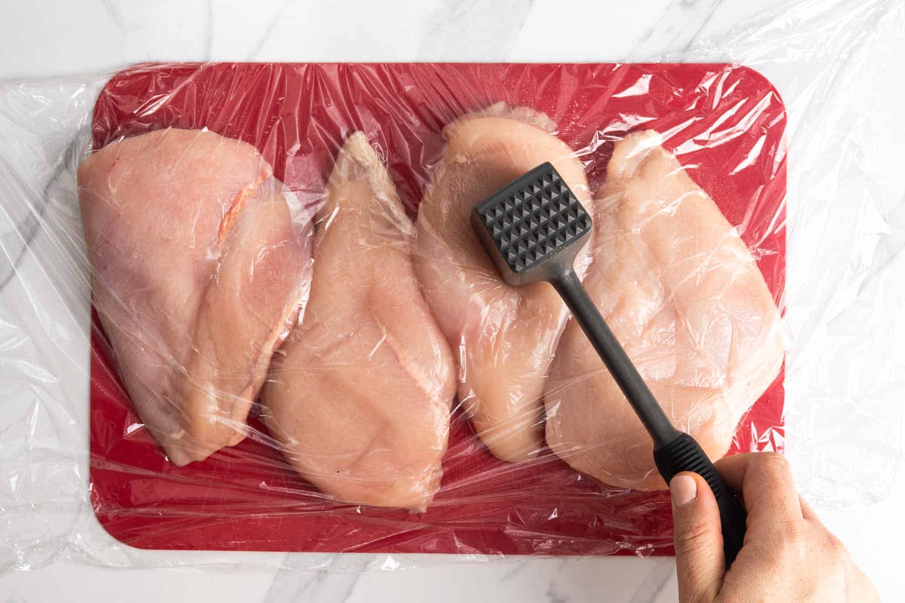pounding boneless skinless chicken breasts before making oven baked chicken breast