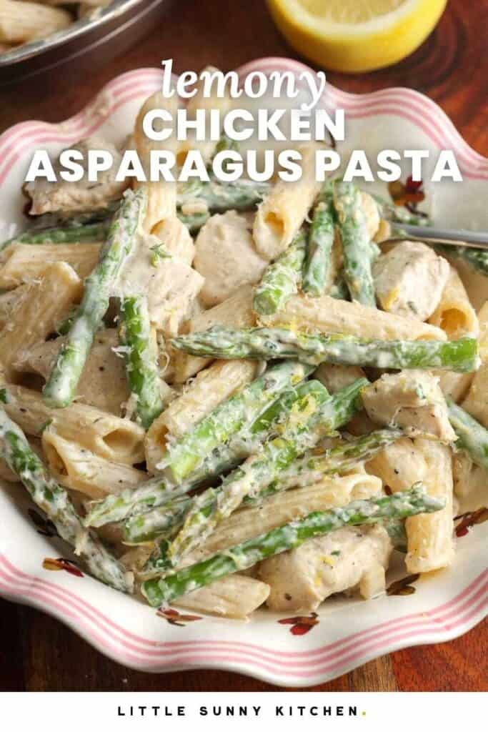 A bowl of pasta with asparagus and chicken. Text overlay says "lemon chicken asparagus pasta"